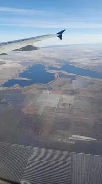 Map, wing, earth, sky. Stock Photos