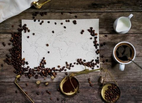 Map of the world, coffee beans on old paper. Eurasia, America, Australia, Africa Stock Photos