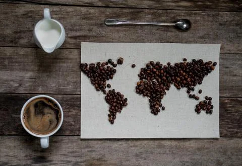 Map of the world, lined with coffee beans on old paper. Eurasia, America Stock Photos