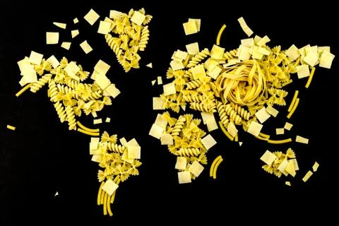 Map of the world made of raw pasta on black background Foto stock