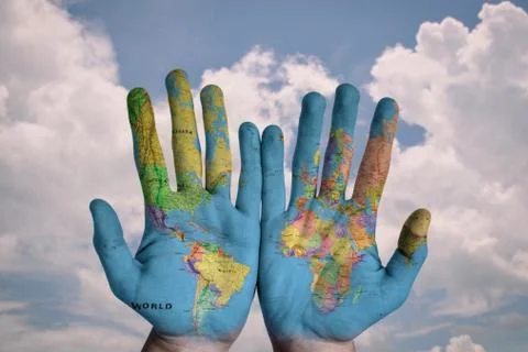 Map of world putting on hands Stock Photos