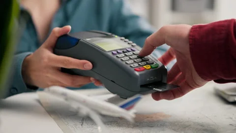 Map of the world, White man Entering the code from the payment card In the m Stock Footage 239644291