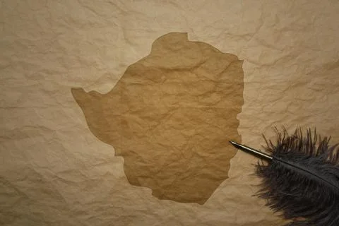 Map of zimbabwe on a old paper background with old pen Stock Photos