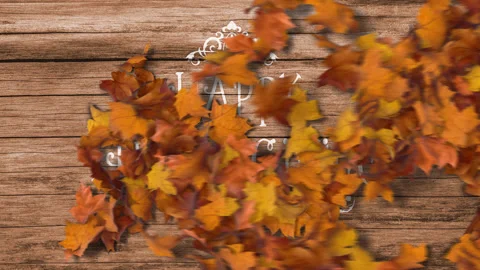 Maple Leaves Getting Blown With Wind and Revealing Happy Thanksgiving Message Stock Footage 221001127