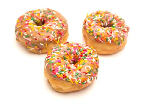 Maple Sprinkle Donuts on a White Background Stock Photos