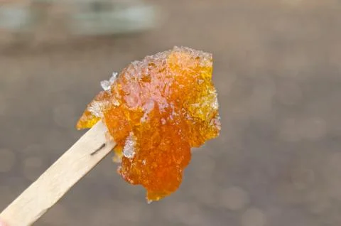 Maple taffy on a stick Stock Photos