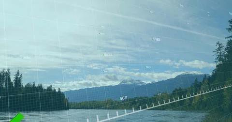 Mapping river valley with evergreens and snowcapped peak under grid overlay axis Foto stock