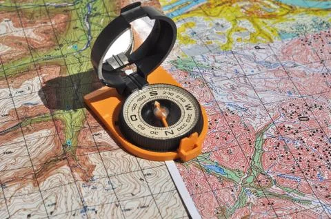 Maps and compass. Stock Photos