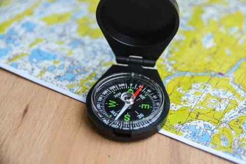 Maps and compass. Stock Photos