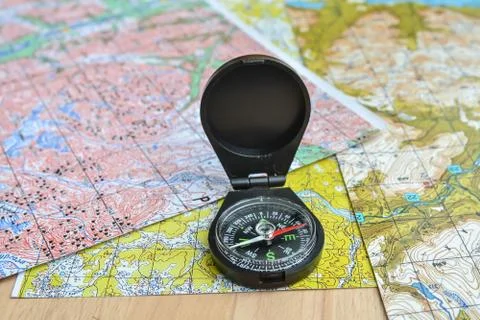Maps and compass. Stock-Fotos