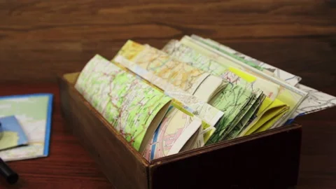 Maps of different countries and the glass Stock Footage 131179194