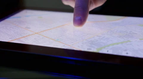 Maps at finger tips on a tablet device in 4K UHD video. Stock Footage 47914181