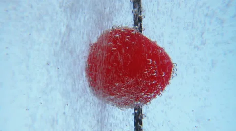 Maraschino cherry in effervescent bubble burst Video stock 67758382