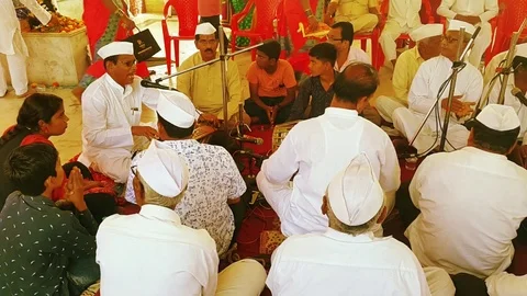 Marathi Singer Playing Instruments and Singing Song during Maharashtra Festival Stock Footage 109407143