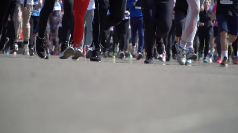 Marathon group of runners during marathon run fast towards finish line Stock Footage 106008034