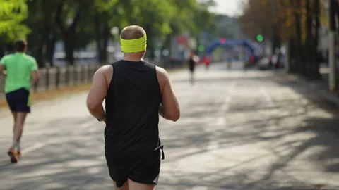 Marathon runner approaching finish line Stock Footage 161952810