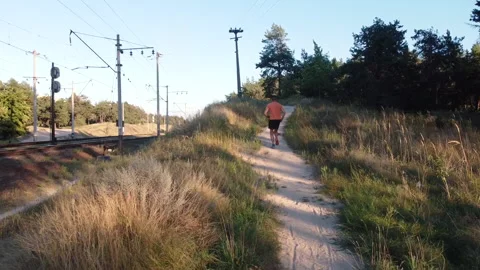 Marathon Runner Jog On Forest. Triathlete Running,Sprinting And Endurance Stock Footage 139062913