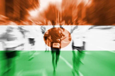 Marathon runner motion blur with blending  Niger flag Foto stock
