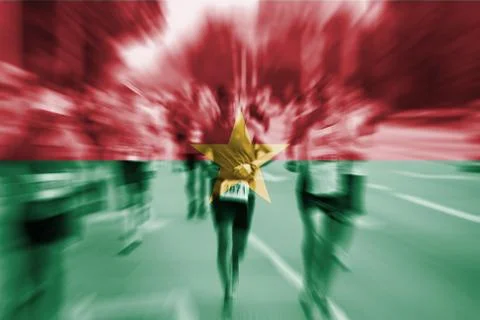 Marathon runner motion blur with blending  Burkina Faso flag 스톡 사진