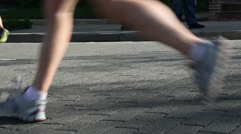 Marathon runners close up of legs and feet during race  EDITORIAL USE ONLY Stock Footage 22657159