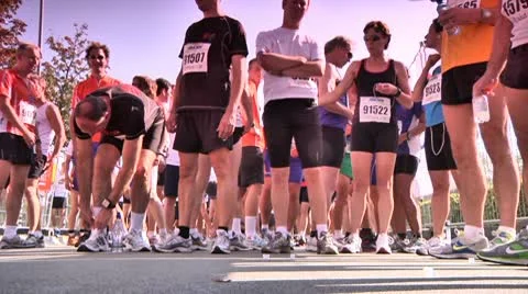 Marathon runners getting ready just before the start of a marathon Stock Footage 10600342