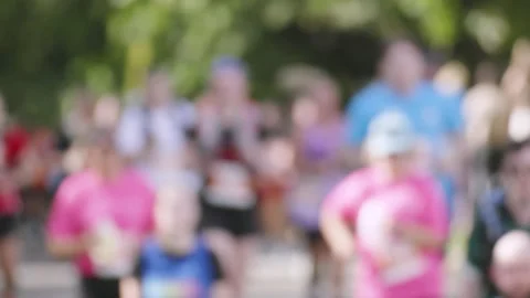 Marathon Runners Jogging in Sunlight in Slow Motion. Stock Footage 346593429