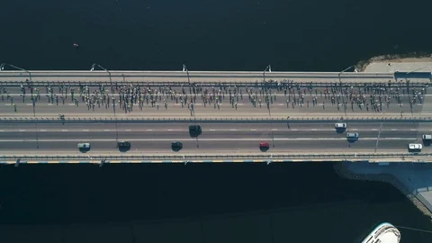 Marathon running on the bridge. Top view Stock Footage 106526162
