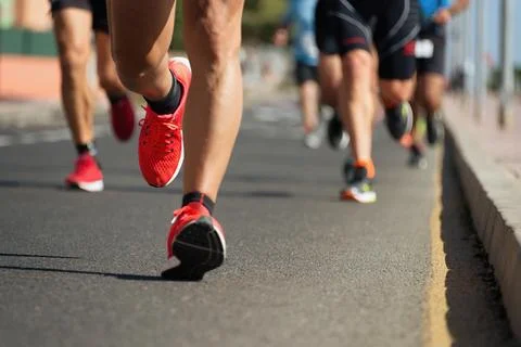 Marathon running in the light of evening Foto stock