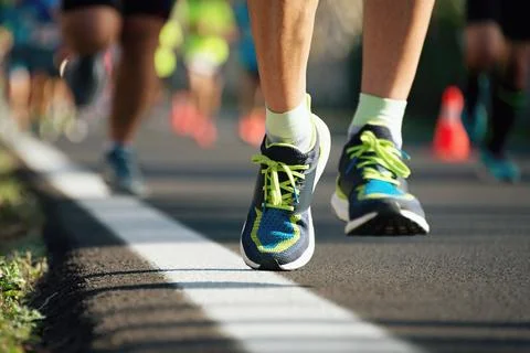 Marathon running in the light of evening Foto stock