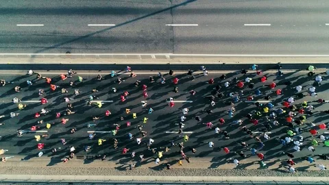 Marathon running on the road. Top view shot Stock Footage 106523797