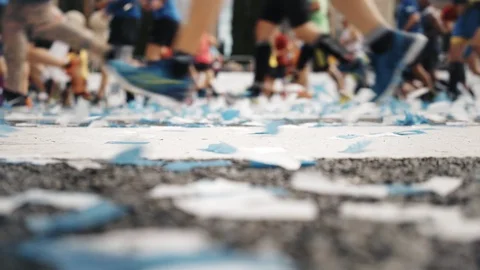 Marathon start finish line with confetti runners Stock-Footage 88464239