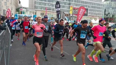 Marathon Start With Runners and Journalist Motorbike 4k Stock Footage 174906093