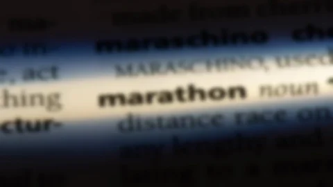 Marathon word in a dictionary. Stock Footage 99563359