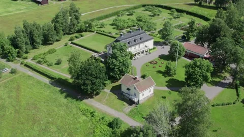 Marbacka, Sweden- July 6, 2026: Aerial Pullback View of Selma Lagerlof Museum Stock Footage 346901215