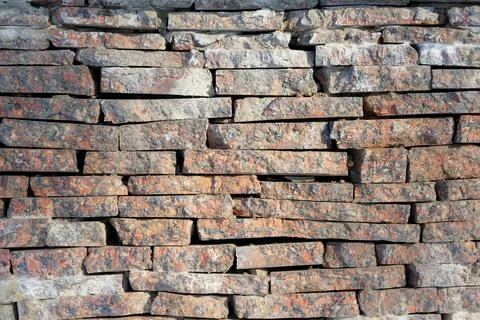 Marble bricks stone wall close up . marble bricks wall texture &amp; pattern Stock Photos