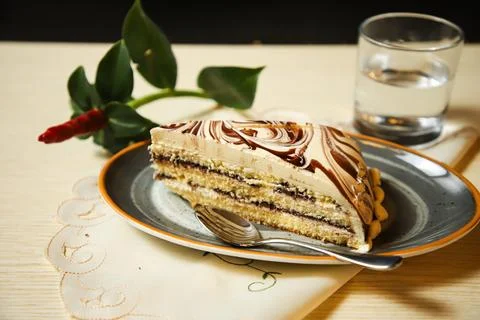 Marble Cake slice include chocolate, cream, sugar with knife served in dish.. Stock Photos