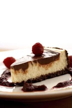 Marble cheesecake with raspberries Stock Photos
