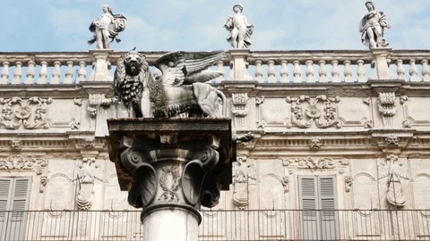 Marble column with A lion in Piazza delle Erbe in Verona, symbol of the Veneto Stock Footage 99297005