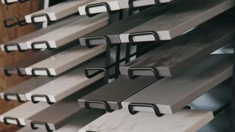 Marble Countertop Sample Options Showcase on the Wall of Architecture Firm Stock Footage 140585487