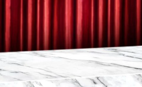 Marble diagonal table with red red curtain wall blur background.Mock up  bann Foto stock