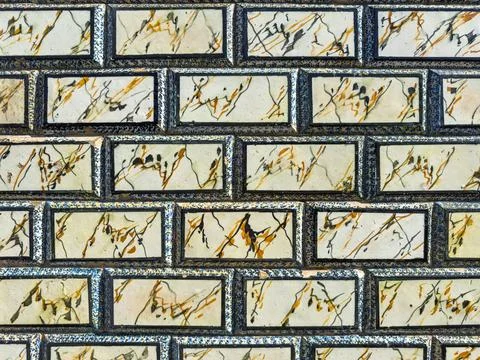 Marble effect rectangular tiles on Portuguese facade Illustrazione stock