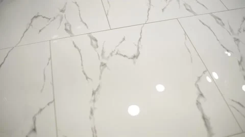  marble floor moving beneath their feet - a subjective view Stock Footage 58592968