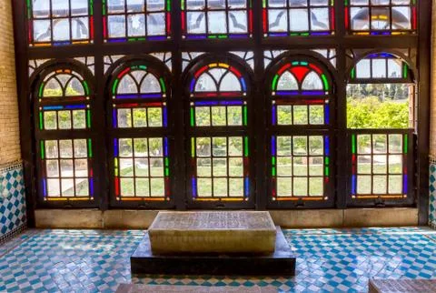 Marble grave by the windows Stock Photos