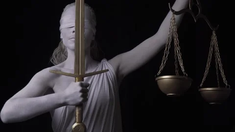 Marble human statue of Themis is holding up the golden sword and the scales, 4k Stock Footage 138426571