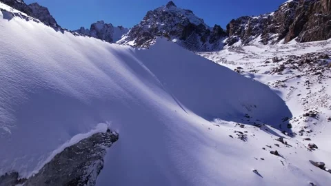 Marble ice wall with a view of the high mountains Video stock 171177736