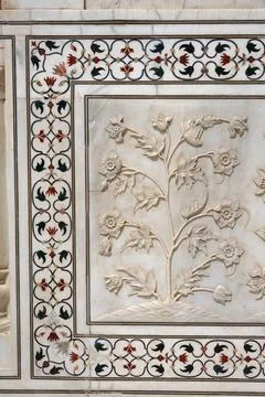 Marble inlay work of interlocking and lower walls sculpted realistic bas re.. Stock Photos