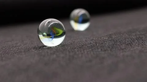 Marble isolated on black background Stock Photos
