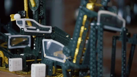 Marble machine. rolling on the plastic path, construction with curved channel Stock Footage 218866496