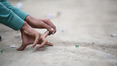 Marble playing Stock Footage 165856103