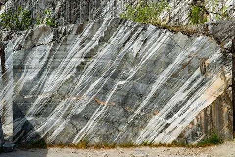 Marble Quarry with Pine Trees and Blue Sky Stock Photos